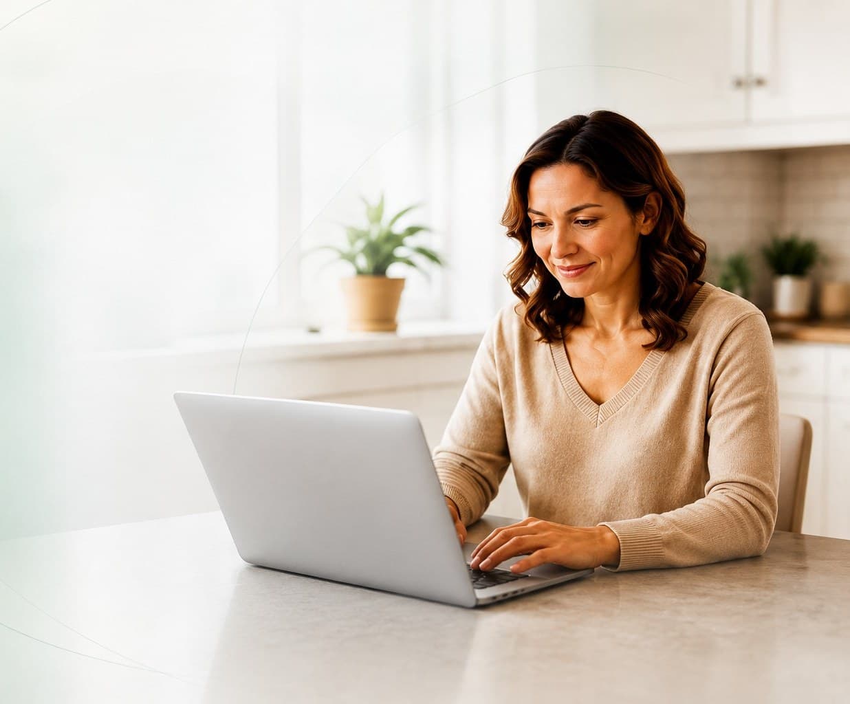 A woman researching online GLP-1 providers on her laptop at home